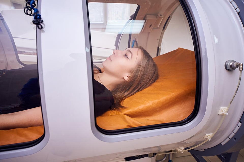Girl in Hyperbaric Oxygen Chamber